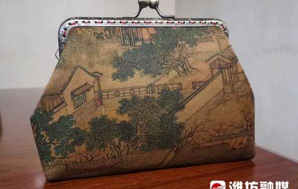Kunsthandwerkerin in Weifang im ostchinesischen Shandong näht Mullgewebe zu Kunstwerken